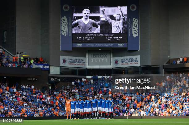 Rangers players hold a minutes silence in memory of former players Davie Wilson and Andy Goram prior to the pre-season friendly match between Rangers...