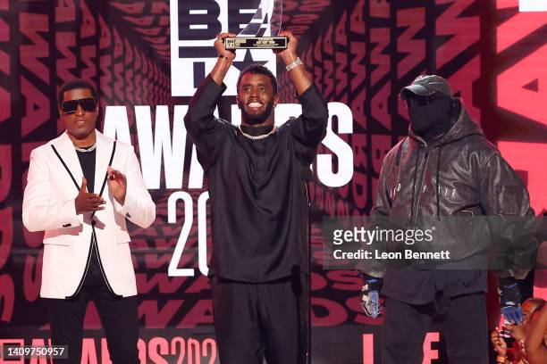 Honoree Sean ‘Diddy’ Combs accepts the BET Lifetime Achievement Award from Babyface and Kanye West onstage during the 2022 BET Awards at Microsoft...