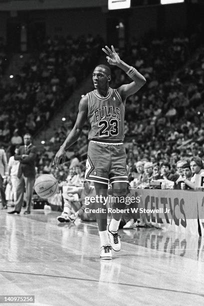 American basketball player Michael Jordan, of the Chicago Bulls, signals a play during a game, Hartford, Connecticut, 1995.