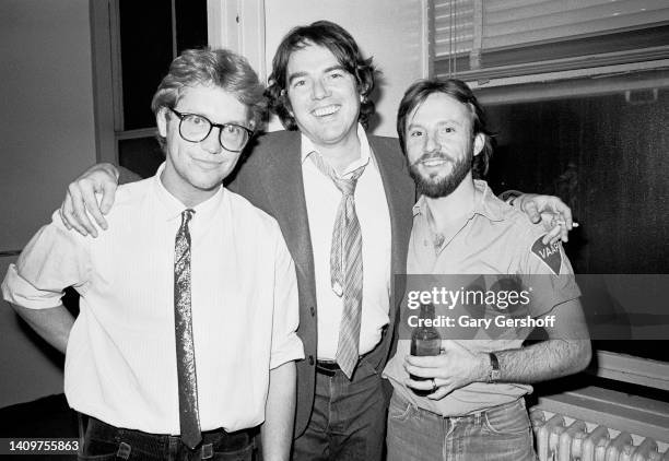 View of Pop musicians Gerry Beckley and Dewey Bunnell , both of the group America, as they pose with composer & musician Jimmy Webb backstage at...