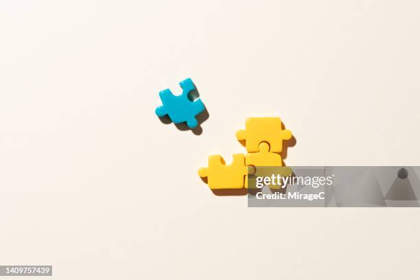 a different piece to the jigsaw puzzle - closing gap stock pictures, royalty-free photos & images