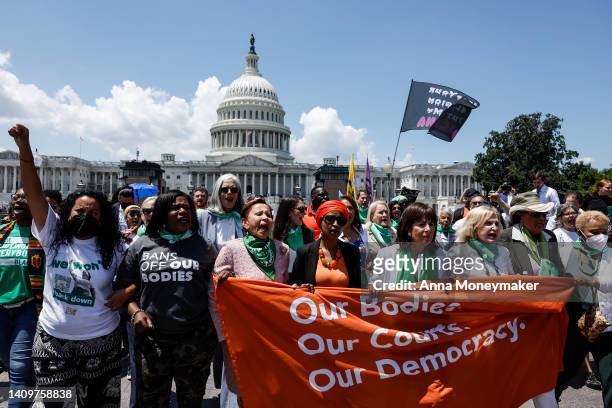 House Democrats join an abortion rights protest with the Center for Popular Democracy Action in front of the U.S. Supreme Court Building on July 19,...