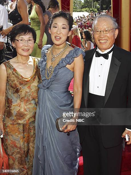 58th ANNUAL PRIMETIME EMMY AWARDS -- Pictured: Sandra Oh wearing a Vera Wang gown and her parents arrive at The 58th Annual Primetime Emmy Awards at...