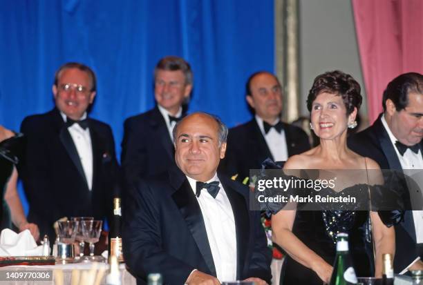 Comedian Danny DeVito stands next to Untied States Congresswoman Connie Morello and Supreme Court Associate Justice Antonin Scalia as President Bill...