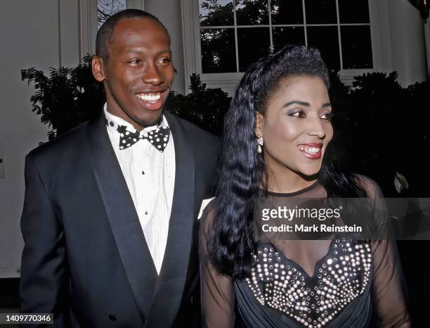 Olympic Gold Medal winner Al Joyner with his wife Olympic Gold Medal winner Florence Griffith Joyner arrive at the White House to attend the black...
