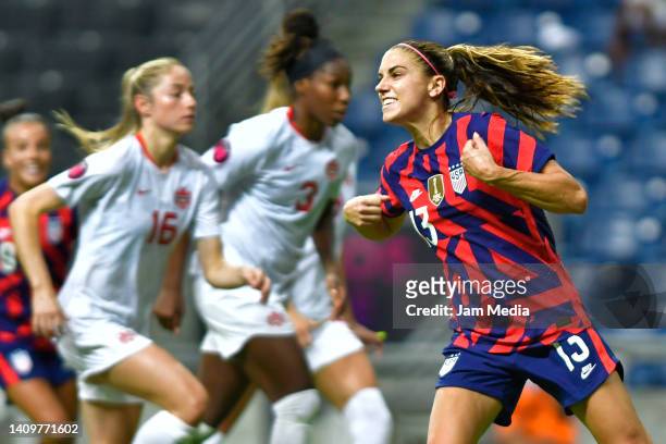 Alex Morgan of United States celebrates after scoring her team's first goal during the championship match between United States and Canada as part of...