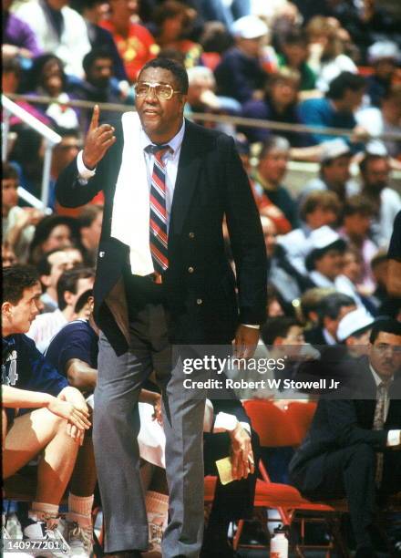 American baketball coach John Thompson of Georgetown University calls a play during game against University of Connecticut, Hartford Connecticut,...