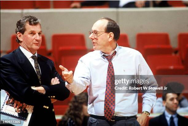 American basketball coaches Jim Calhoun , of the University of Connecticut, and Jim Boeheim, of Syracuse University, talk before a game, Hartford,...