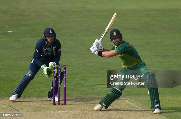 South Africa batsman Aiden Markram hits out watched by Jos Buttler during the First Royal London ODI match between England and South Africa at...