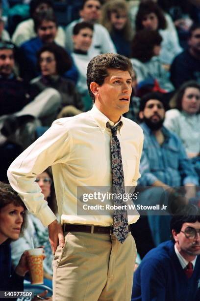 Italian-born American basketball coach Geno Auriemma of the University of Connecticut watches the action during a game in Gampel Pavilion, Storrs,...