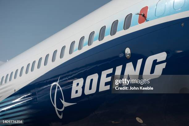 The Boeing logo is seen on the side of a Boeing 737 MAX during the Farnborough International Airshow 2022 on July 18, 2022 in Farnborough, England....