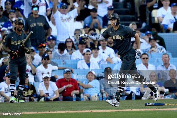 Giancarlo Stanton of the New York Yankees rounds the bases after hitting a two RBI home run against the National League in the fourth inning during...
