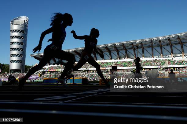 Ida Karstoft of Team Denmark, and Dalia Kaddari of Team Italy cross the finish line of the Women's 200m Semi-Final on day five of the World Athletics...