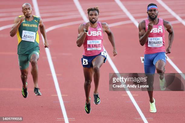 Luxolo Adams of Team South Africa, Noah Lyles of Team United States, and Kenneth Bednarek of Team United States compete in the Men's 200m Semi-Final...