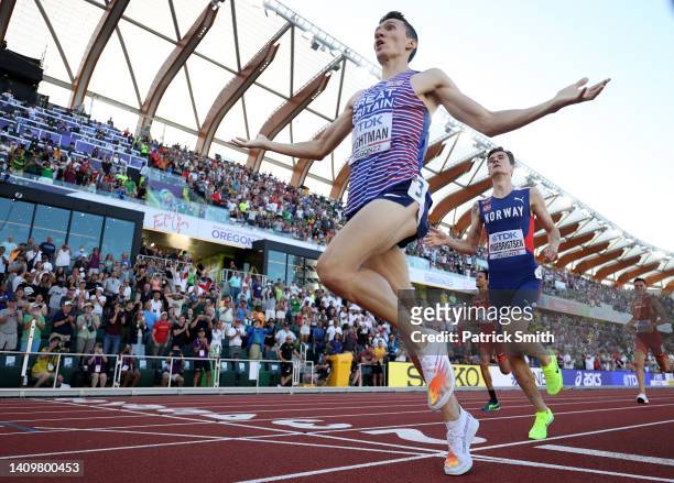 Jake Wightman of Team Great Britain and Jakob Ingebrigtsen of Team Norway cross the finish line in the Men's 1500m Final on day five of the World...