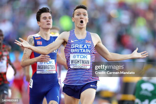 Jake Wightman of Team Great Britain and Jakob Ingebrigtsen of Team Norway cross the finish line in the Men's 1500m Final on day five of the World...