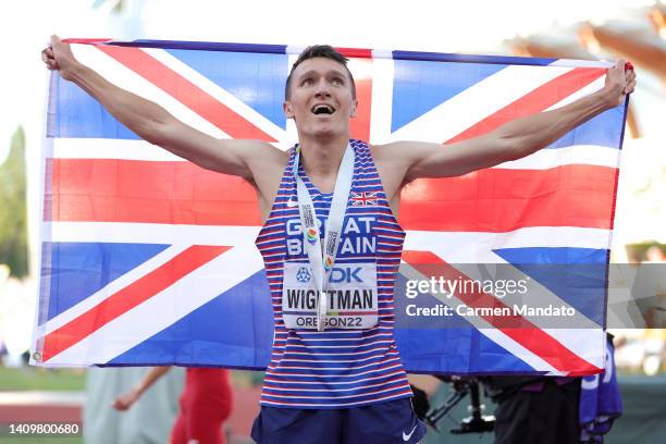 Jake Wightman of Team Great Britain celebrate after winning gold in the Men's 1500m Final on day five of the World Athletics Championships Oregon22...