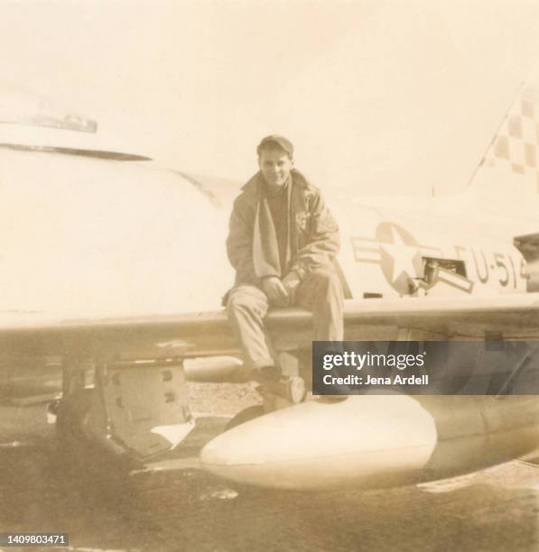 vintage military air force veteran sitting on vintage plane - sepia fotografías e imágenes de stock