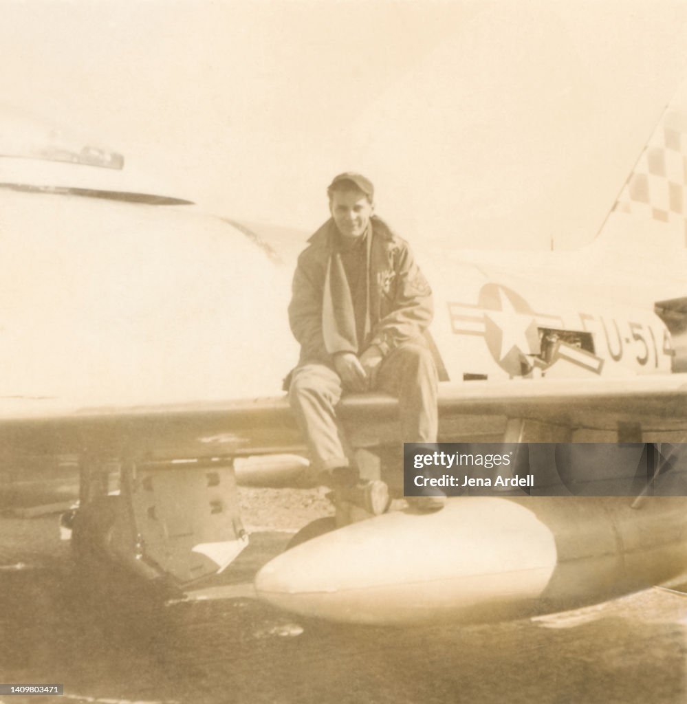 Vintage Military Air Force Veteran Sitting on Vintage Plane