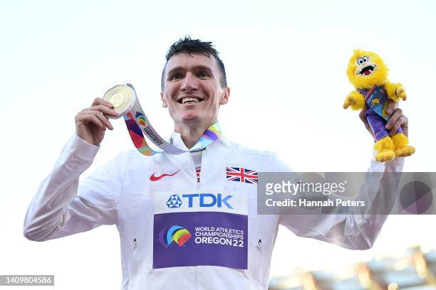 Gold medalist Jake Wightman of Team Great Britain poses during the medal ceremony for the Men's 1500m Final on day five of the World Athletics...
