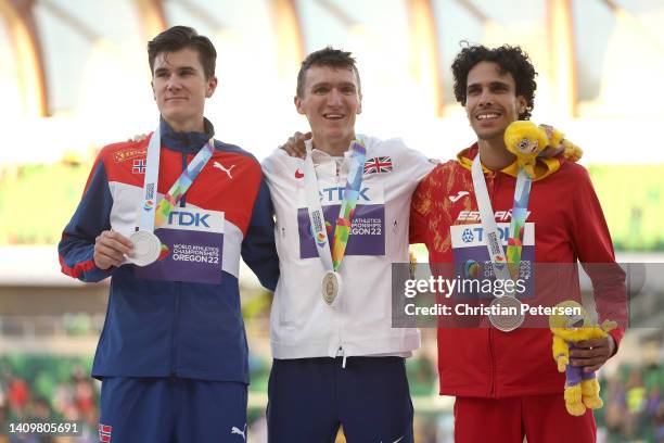 Silver medalist Jakob Ingebrigtsen of Team Norway, gold medalist Jake Wightman of Team Great Britain, and bronze medalist Mohamed Katir of Team Spain...