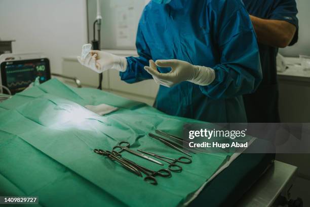 veterinarians unrecognizable before surgery. - human castration photo stock pictures, royalty-free photos & images