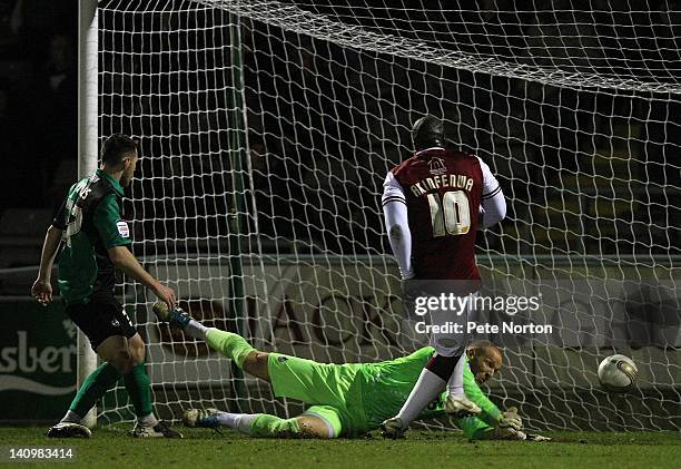 Adebayo Akinfenwa of Northampton Town scores his and his sides second goal during the npower League Two match between Northampton Town and Bristol...