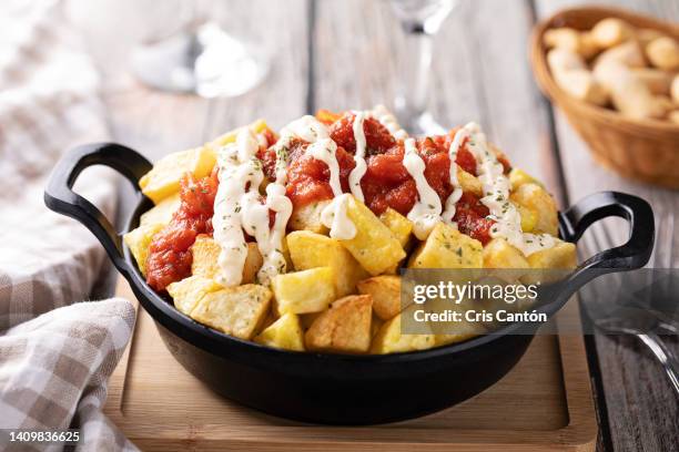 patatas bravas and aioli - patatas bravas stock pictures, royalty-free photos & images