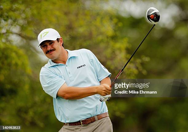 Johnson Wagner hits a shot during first round of the World Golf Championships-Cadillac Championship on the TPC Blue Monster at Doral Golf Resort And...