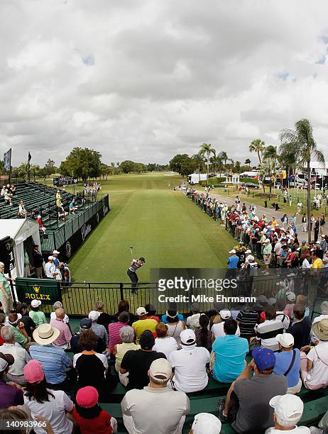 Paul Casey of England hits a shot on the first tee during first round of the World Golf Championships-Cadillac Championship on the TPC Blue Monster...