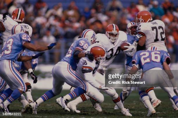 Lorenzo White, Running Back for the Cleveland Browns runs the football through the Houston Oilers defence during the American Football Conference...