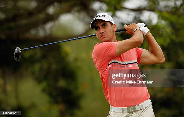 Rafael Cabrera Bello of Spain hits a shot during first round of the World Golf Championships-Cadillac Championship on the TPC Blue Monster at Doral...