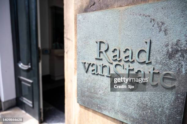 raad van state dutch supreme court building entrance in the hague - democracy stock pictures, royalty-free photos & images