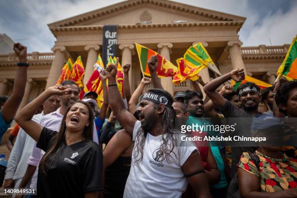 People react in protest to the announcement of newly elected Sri Lankan President Ranil Wickremesinghe on July 20, 2022 in Colombo, Sri Lanka. The...
