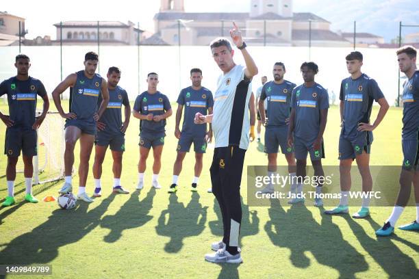 Bruno Lage, Manager of Wolverhampton Wanderers speaks to the players during a Wolverhampton Wanderers Pre-Season Training Session on July 18, 2022 in...