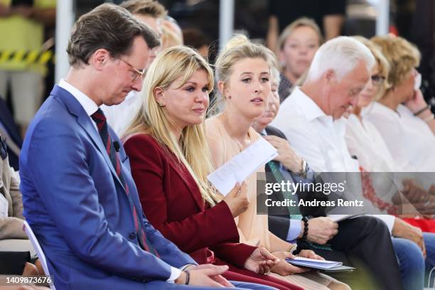 Hendrik Wüst, CDU premier of North Rhine-Westphalia, Corinna Schumacher, wife of former Formula One champion Michael Schumacher and her daughter Gina...