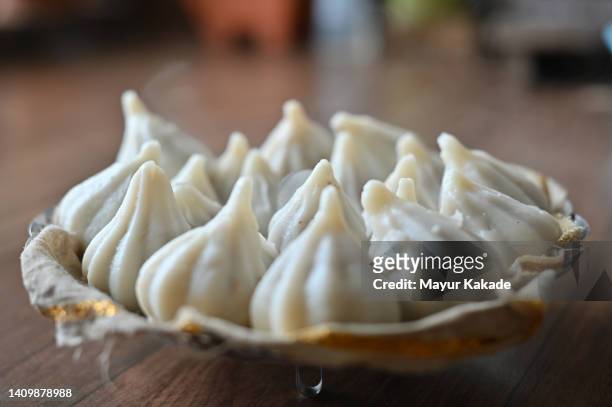 freshly cooked sweet dish - ganesh chaturthi stock pictures, royalty-free photos & images