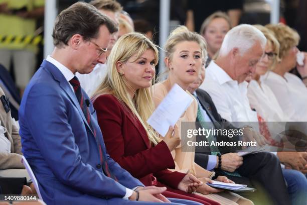 Hendrik Wüst, CDU premier of North Rhine-Westphalia, Corinna Schumacher, wife of former Formula One champion Michael Schumacher and her daughter Gina...