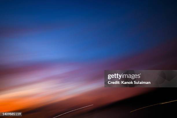 sunset background - thunderstorm ocean blue stock pictures, royalty-free photos & images