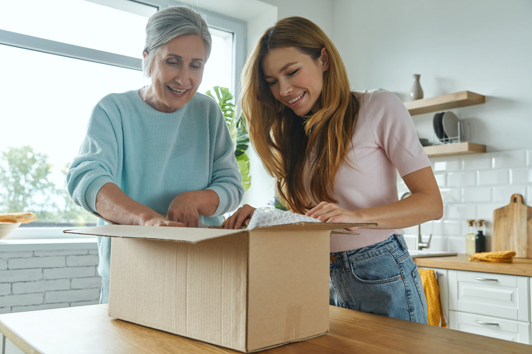 people opening boxes