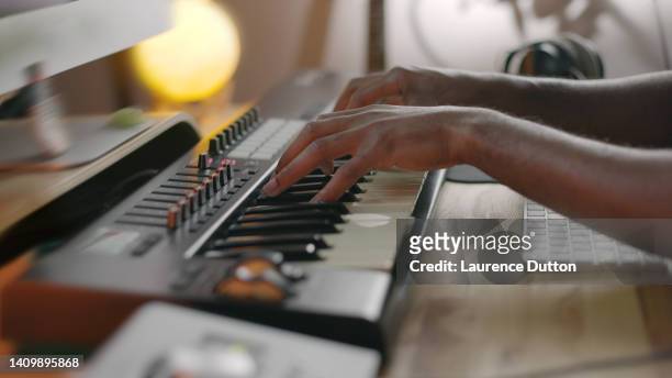 musician playing keyboard - electronic music stock pictures, royalty-free photos & images