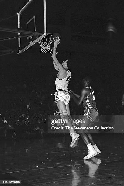 Dolph Schayes of the Syracuse Nationals shoots against the St. Louis Hawks circa 1962 at the Onondaga War Memorial Arena in Syracuse, New York. NOTE...