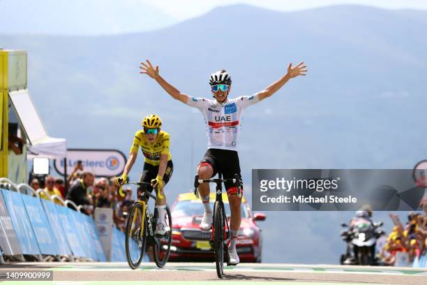 Tadej Pogacar of Slovenia and UAE Team Emirates - White Best Young Rider Jersey celebrates at finish line as stage winner ahead of Jonas Vingegaard...