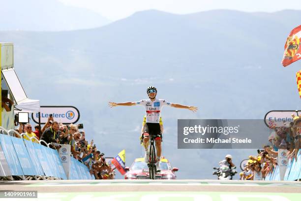 Tadej Pogacar of Slovenia and UAE Team Emirates - White Best Young Rider Jersey celebrates at finish line as stage winner ahead of Jonas Vingegaard...