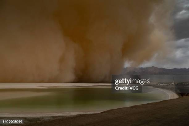 General view during a sandstorm engulfing the Emerald Lake tourist attraction in Da Qaidam Town on July 20, 2022 in Da Qaidam District, Haixi Mongol...