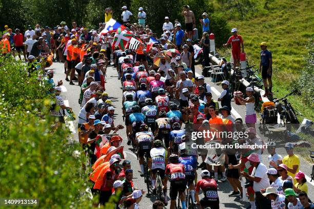 General view of the peloton climbing the Peyragudes while fans cheer during the 109th Tour de France 2022, Stage 17 a 129,7km stage from...