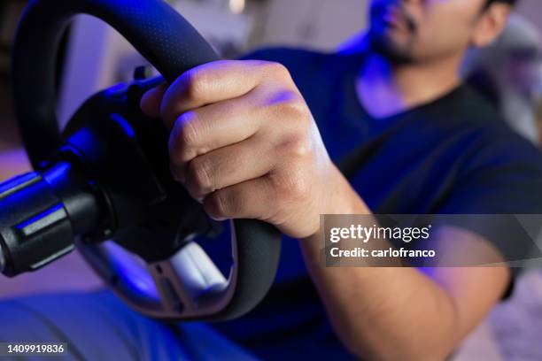 racing in the living room - gaspedaal stockfoto's en -beelden