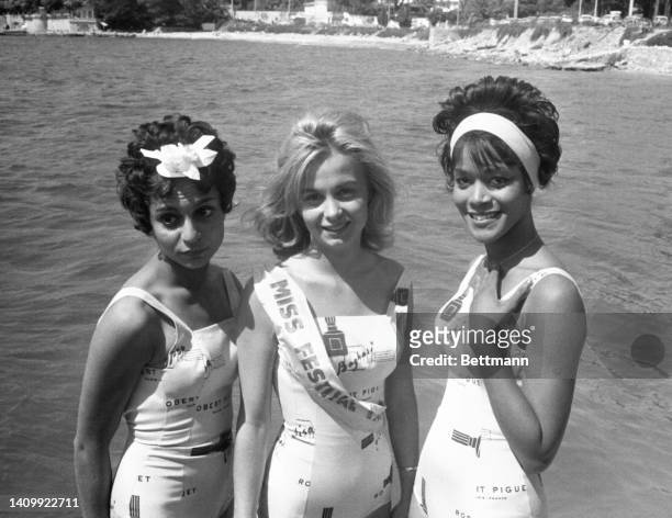 Jocelyn Lacour of Monaco is the new Miss Festival at the Cannes Film Festival. She is flanked by the runners up. To her left stands Suzanne Gardone...