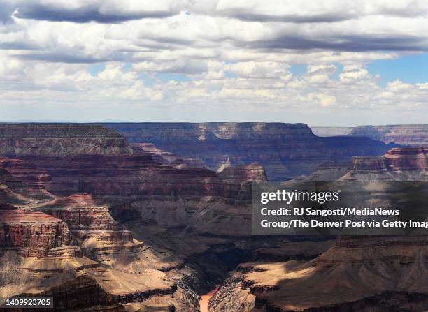 The Colorado River runs through the south rim of the Grand Canyon seen from atop Hopi Point on July 5, 2022 in Grand Canyon Village, Arizona.