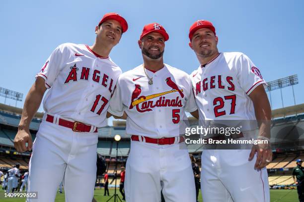 Shohei Ohtani and Mike Trout of the Los Angeles Angels pose for a photo with Albert Pujols of the St. Louis Cardinals during the Gatorade All-Star...